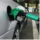 Photo of a car filling up on petrol Photo of a car filling up on petrol