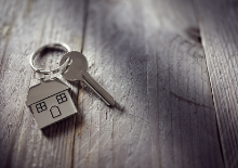 Key on house shaped keyring