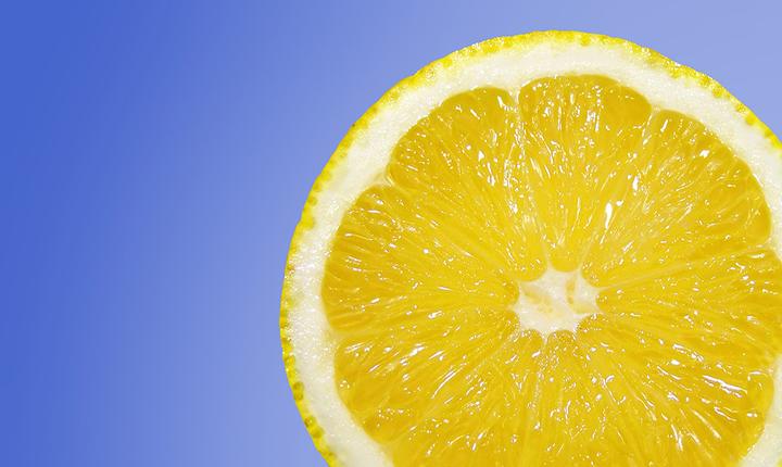 Sliced lemon in light-blue background